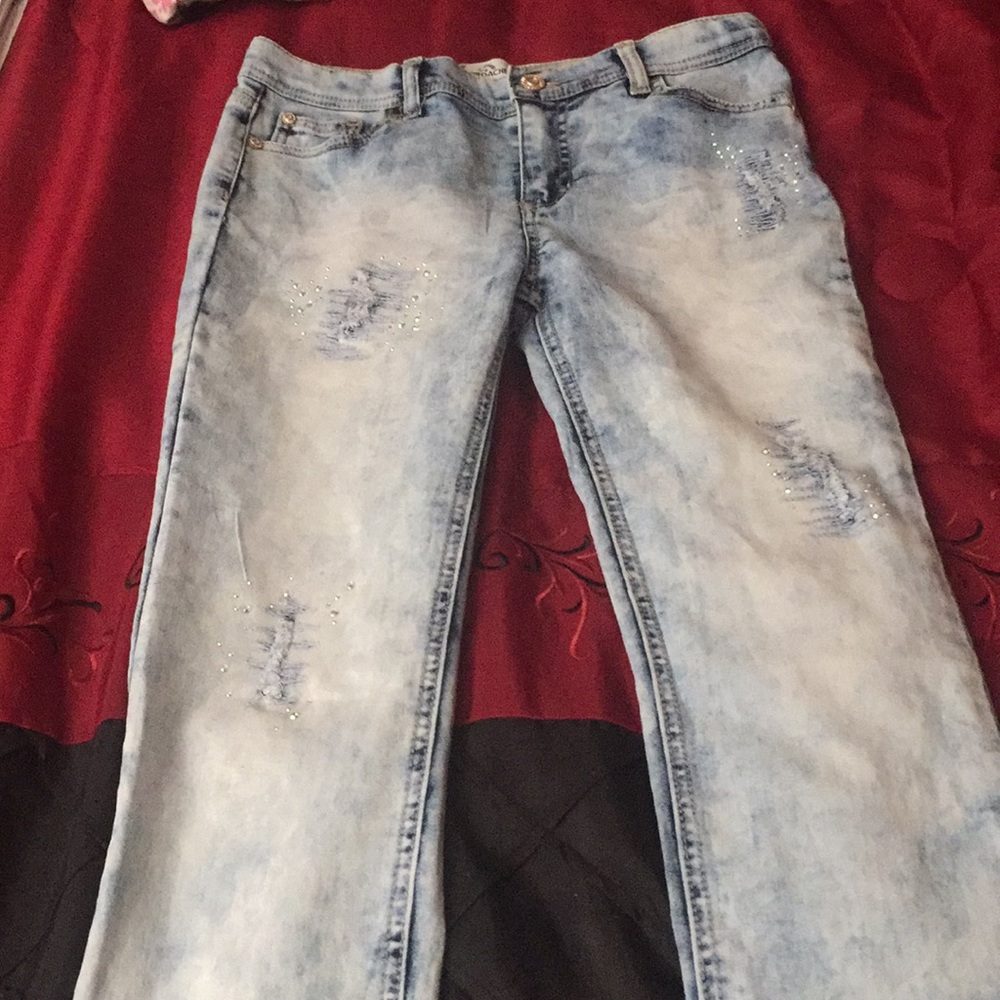 Ripped and shiny jeans